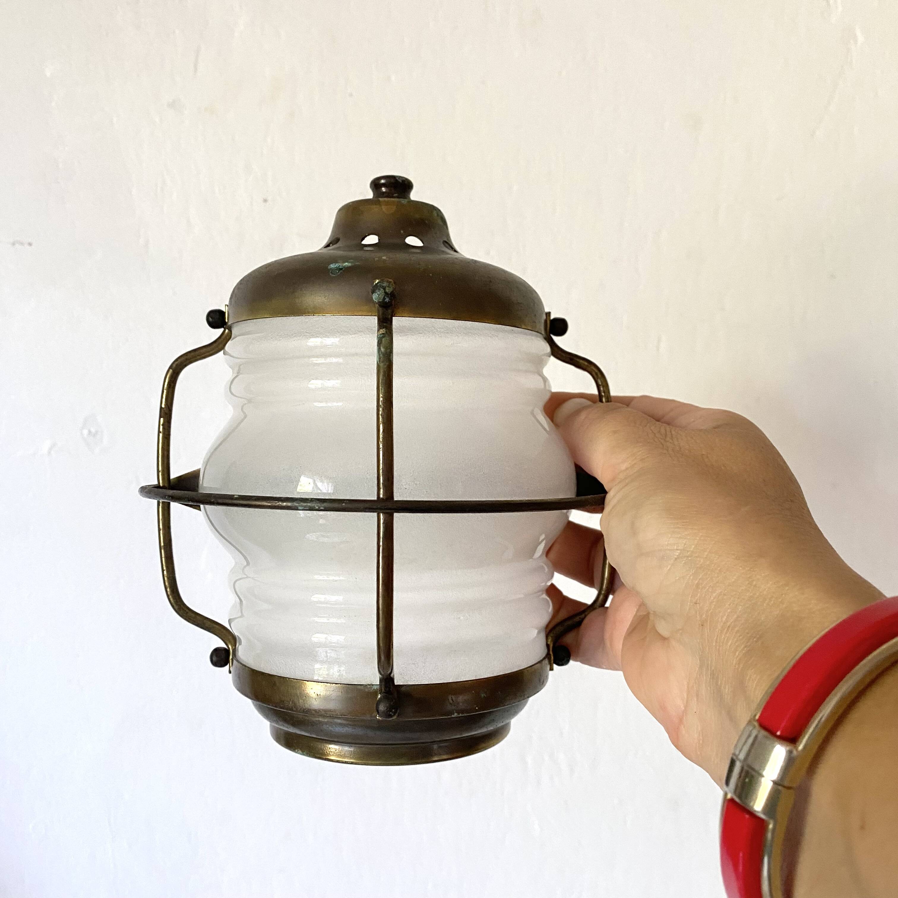 Pair of marine glass and brass wall lights