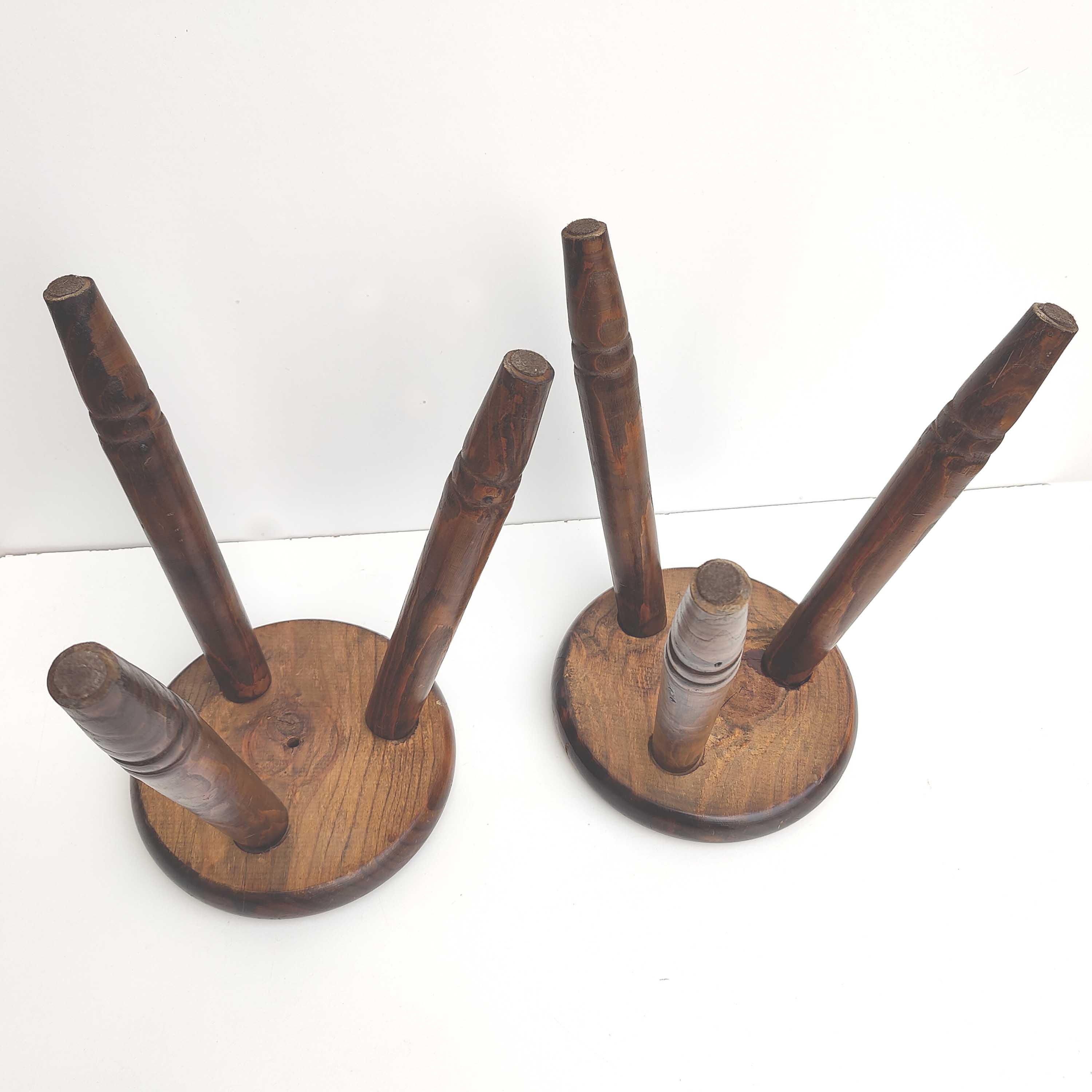 Pair of wooden tripod stools