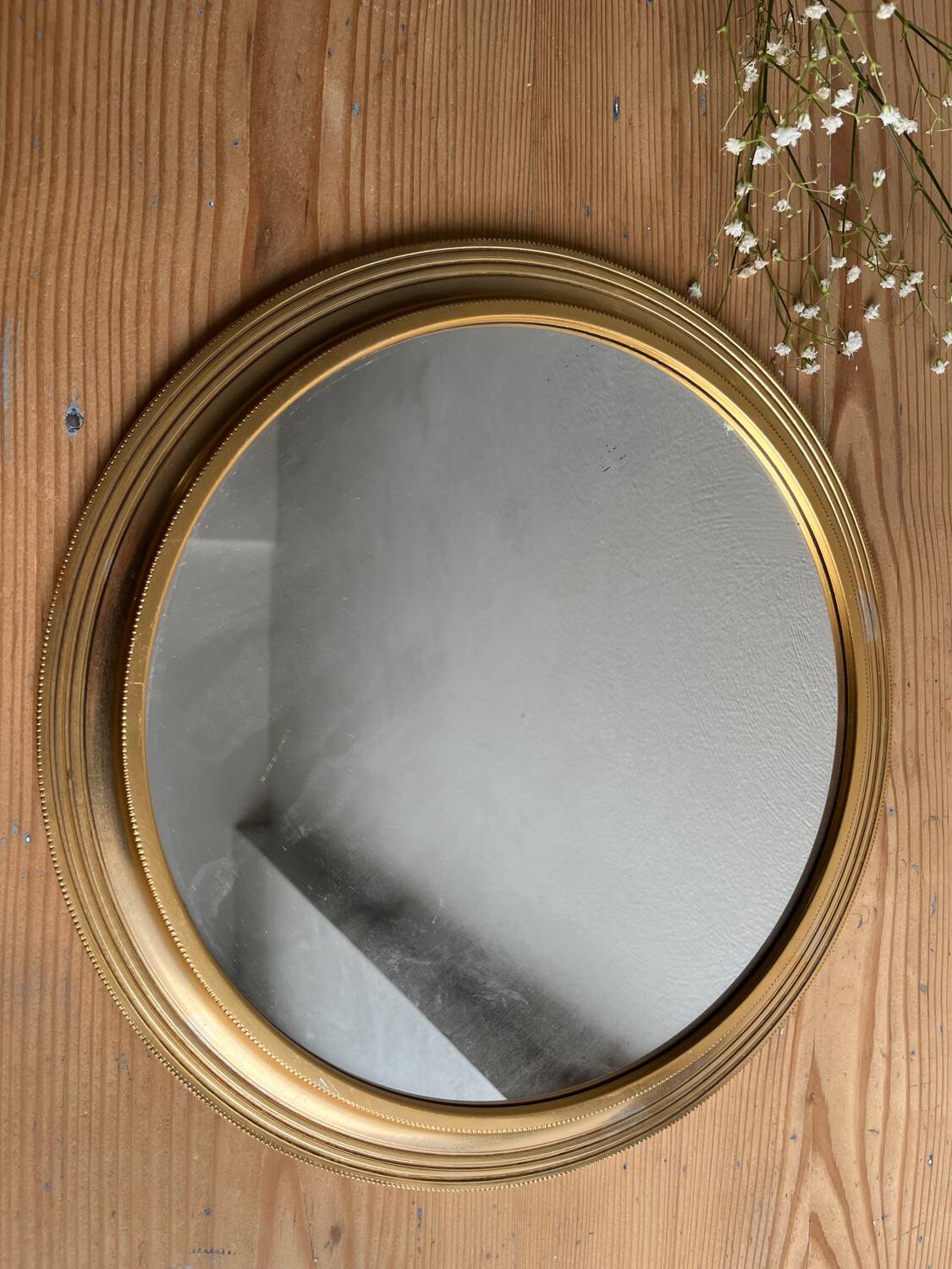 Vintage gold round mirror