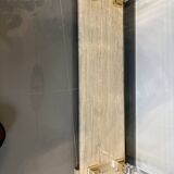 Hollywood Regency console style in travertine, glass, and Lucite.