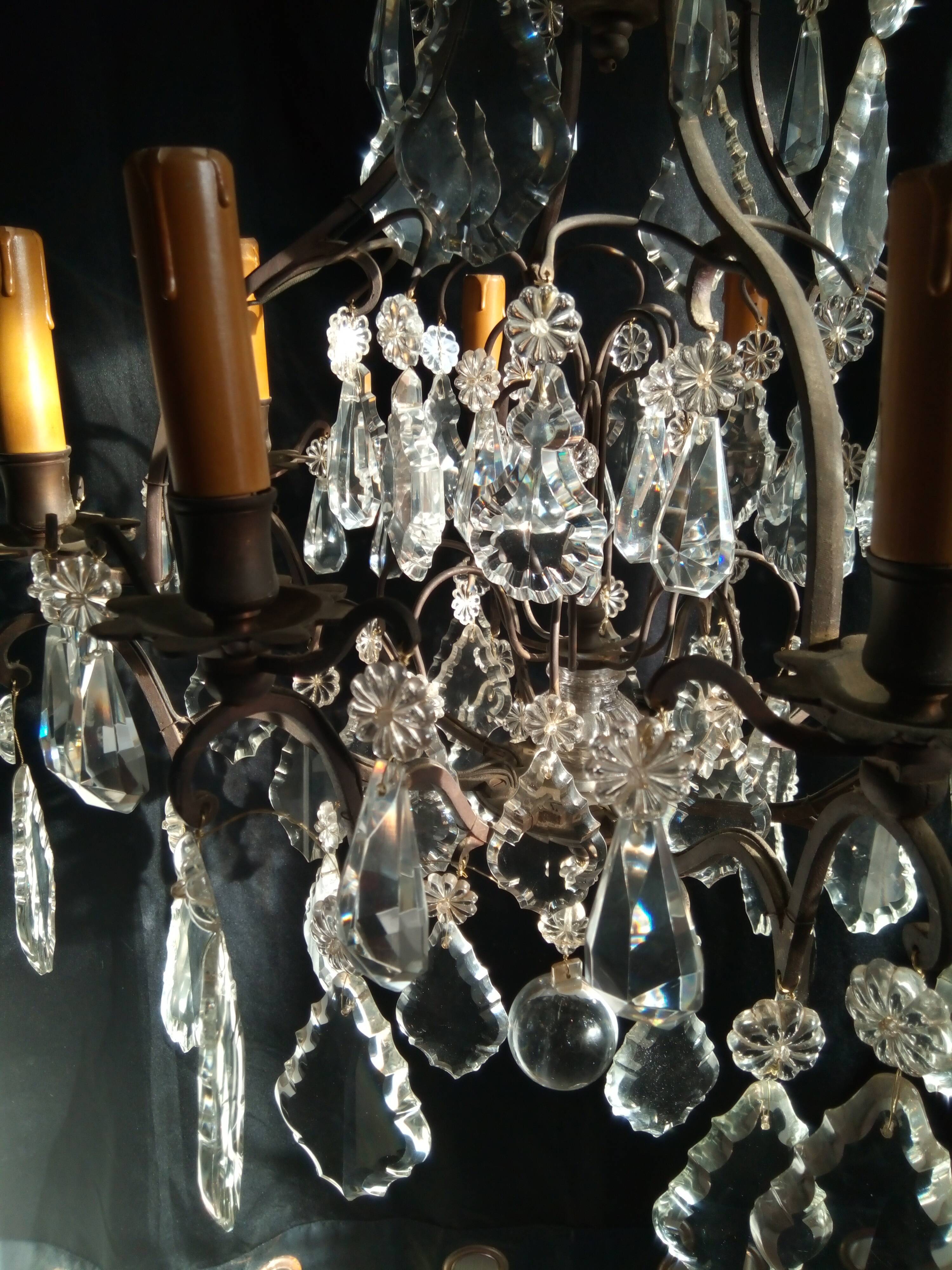 Old chandelier with tassels, bronze and crystal, 8 lights. Louis XV style.