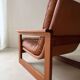 Vintage lounge chair in teak and leather from the 1960s.
