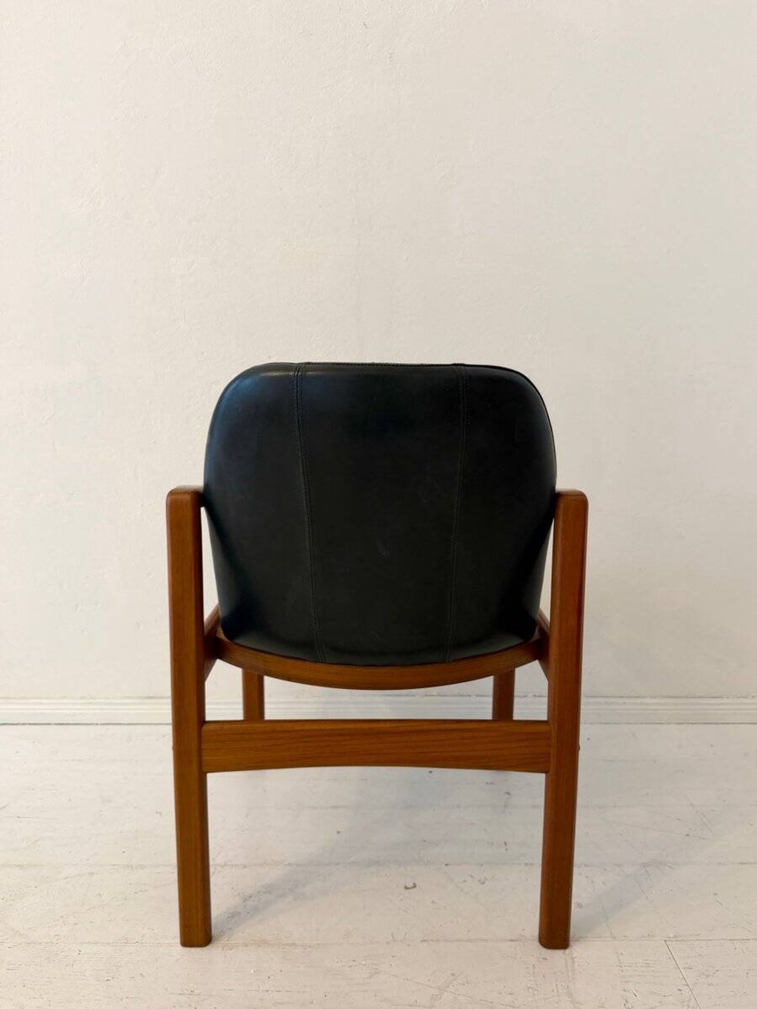 Mid-century modern chair in teak and black leather, Germany, 1960s