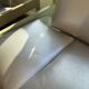 Pair of Argos armchairs by Baumann in green and silver leather.