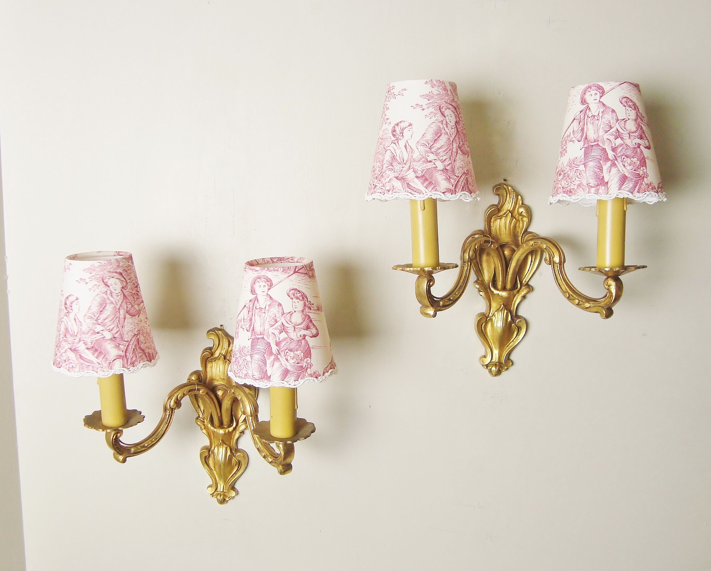 Pair of bronze sconces with four handmade toile de Jouy lampshades in France