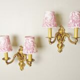 Pair of bronze sconces with four handmade toile de Jouy lampshades in France