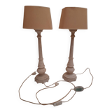 A pair of antique desk lamps with white marble bases