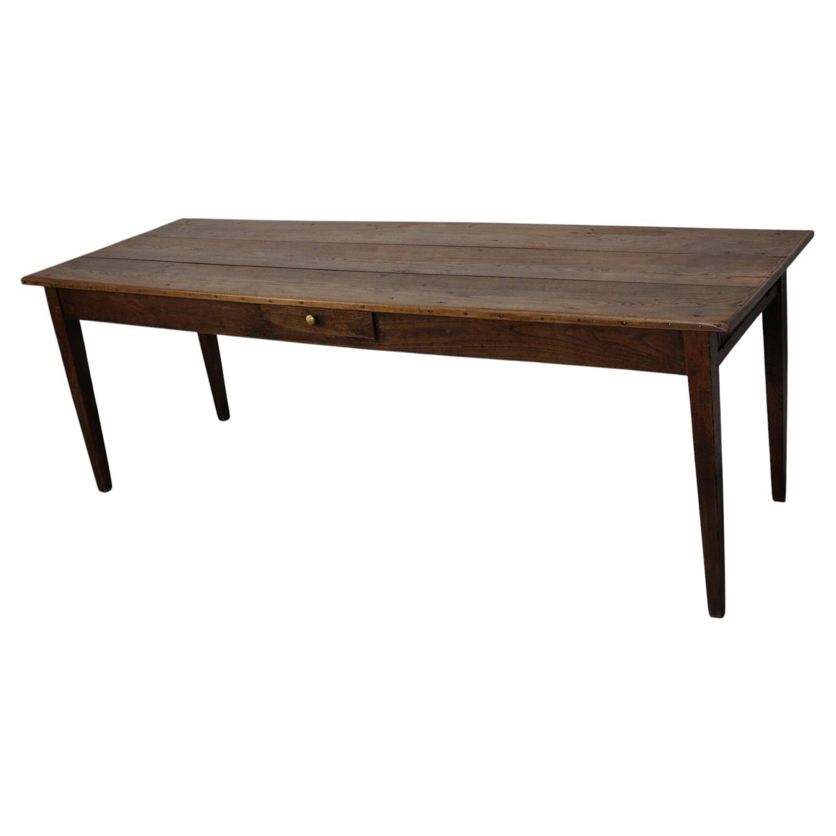 Large rustic farmhouse dining table from the French 19th century, in old elm