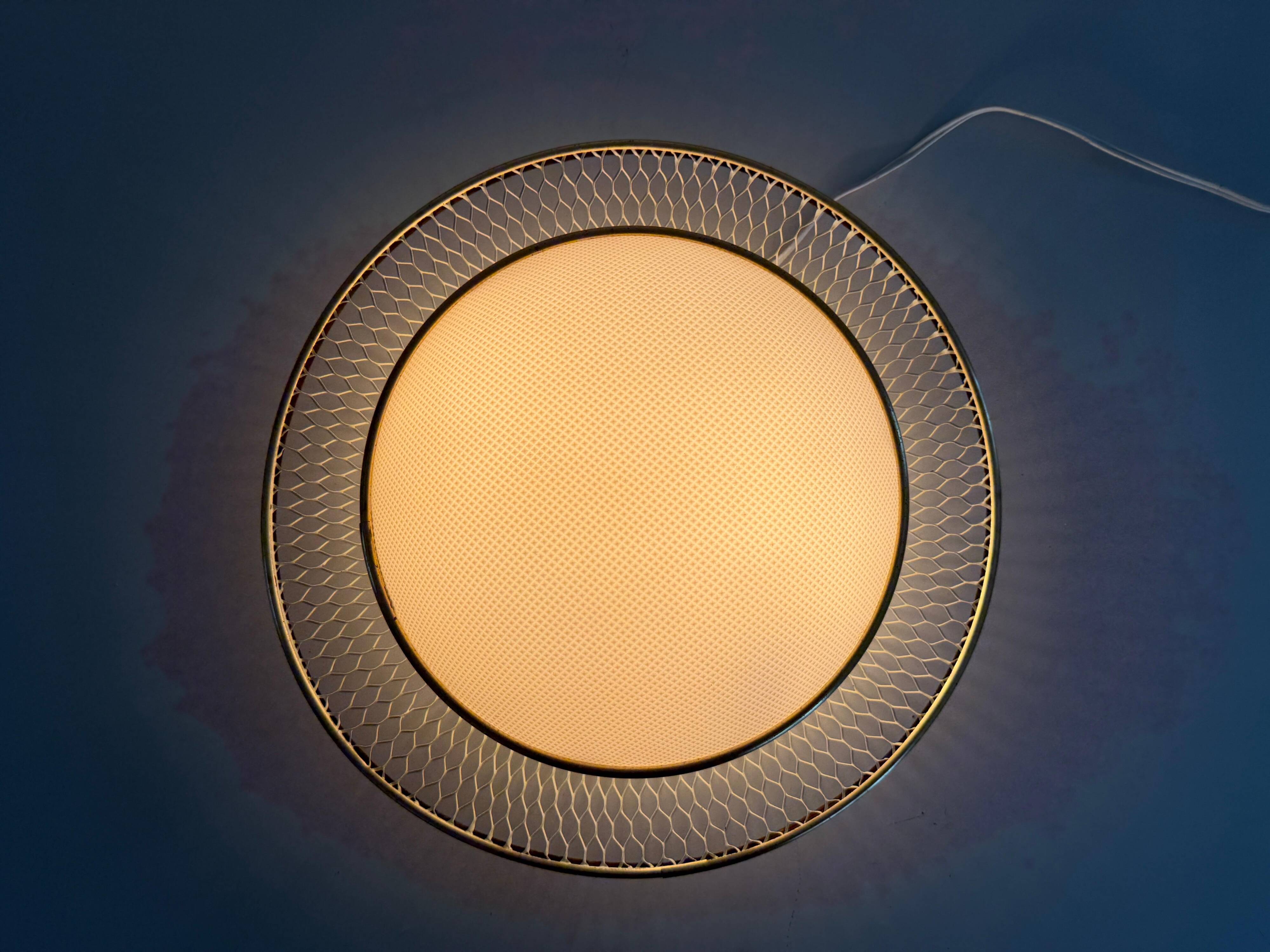 Mid-century golden metal wire and plastic ceiling light by Erco, 1950s, Germany.