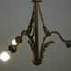Antique pendant lamp with gold-coloured and ornate details and 3 fittings