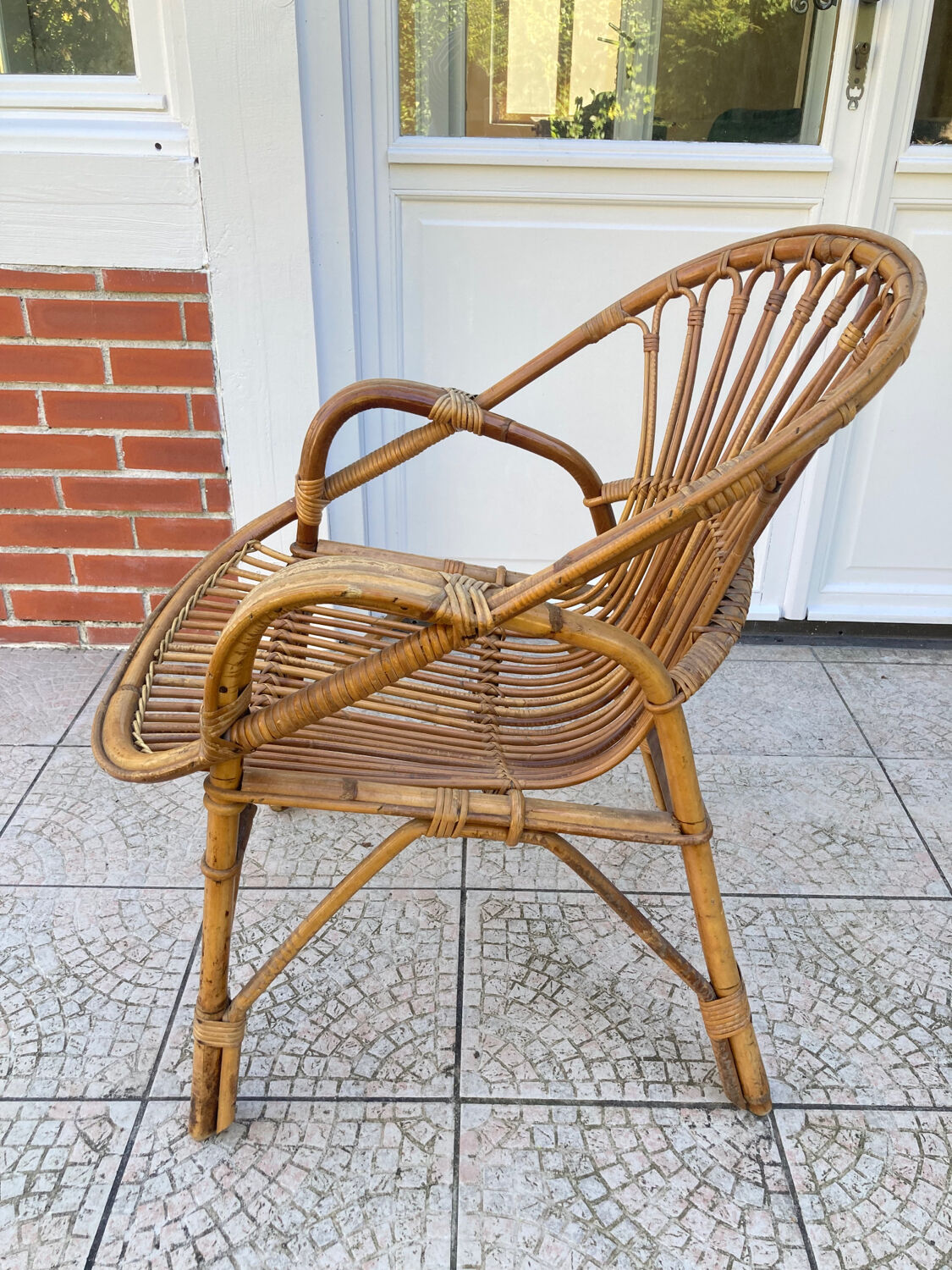 Vintage shell rattan armchair