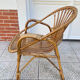Vintage shell rattan armchair