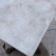 Bistro pedestal table in marble and cast iron lion paws