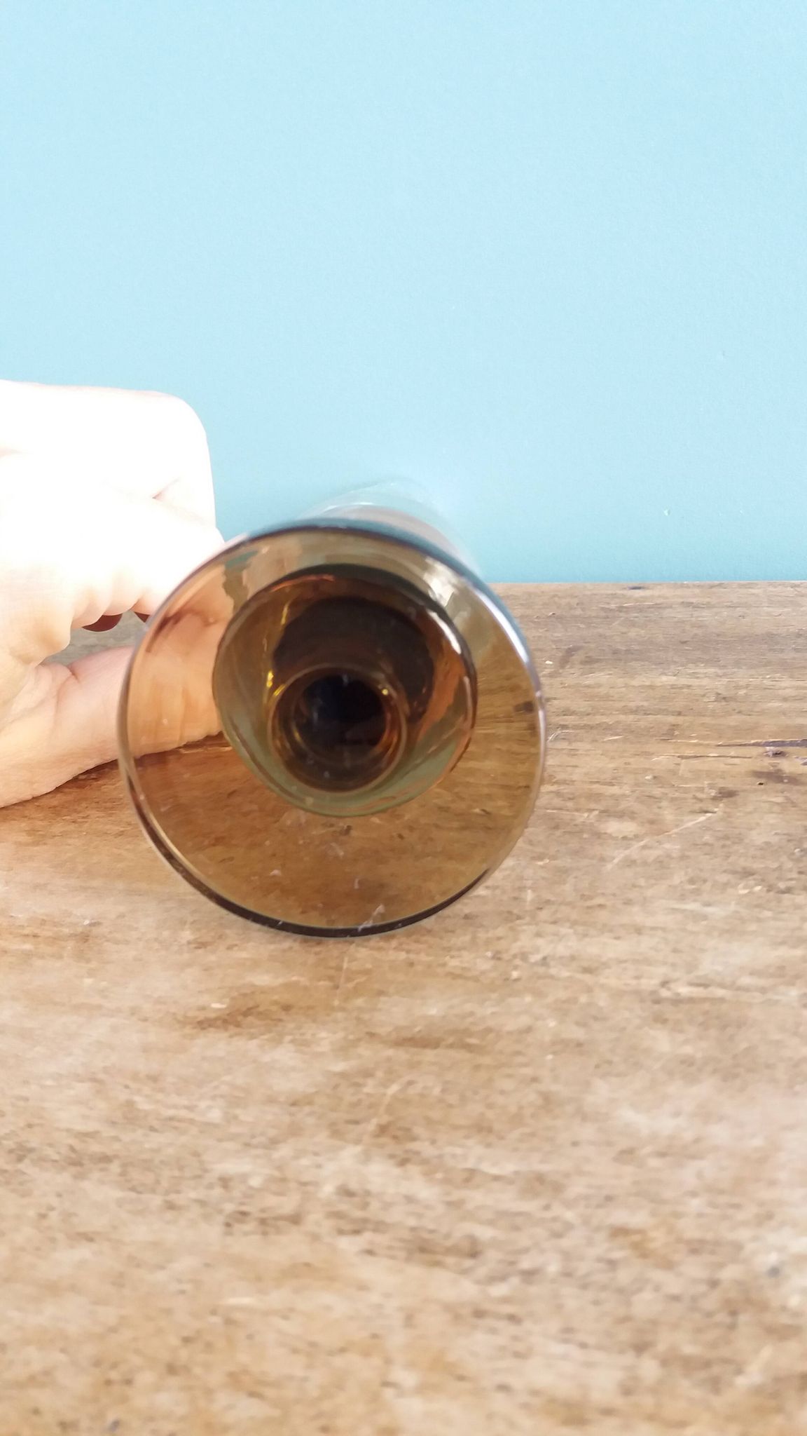 Cut glass soliflore vase with a smoked glass base.
