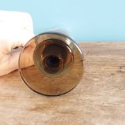 Cut glass soliflore vase with a smoked glass base.