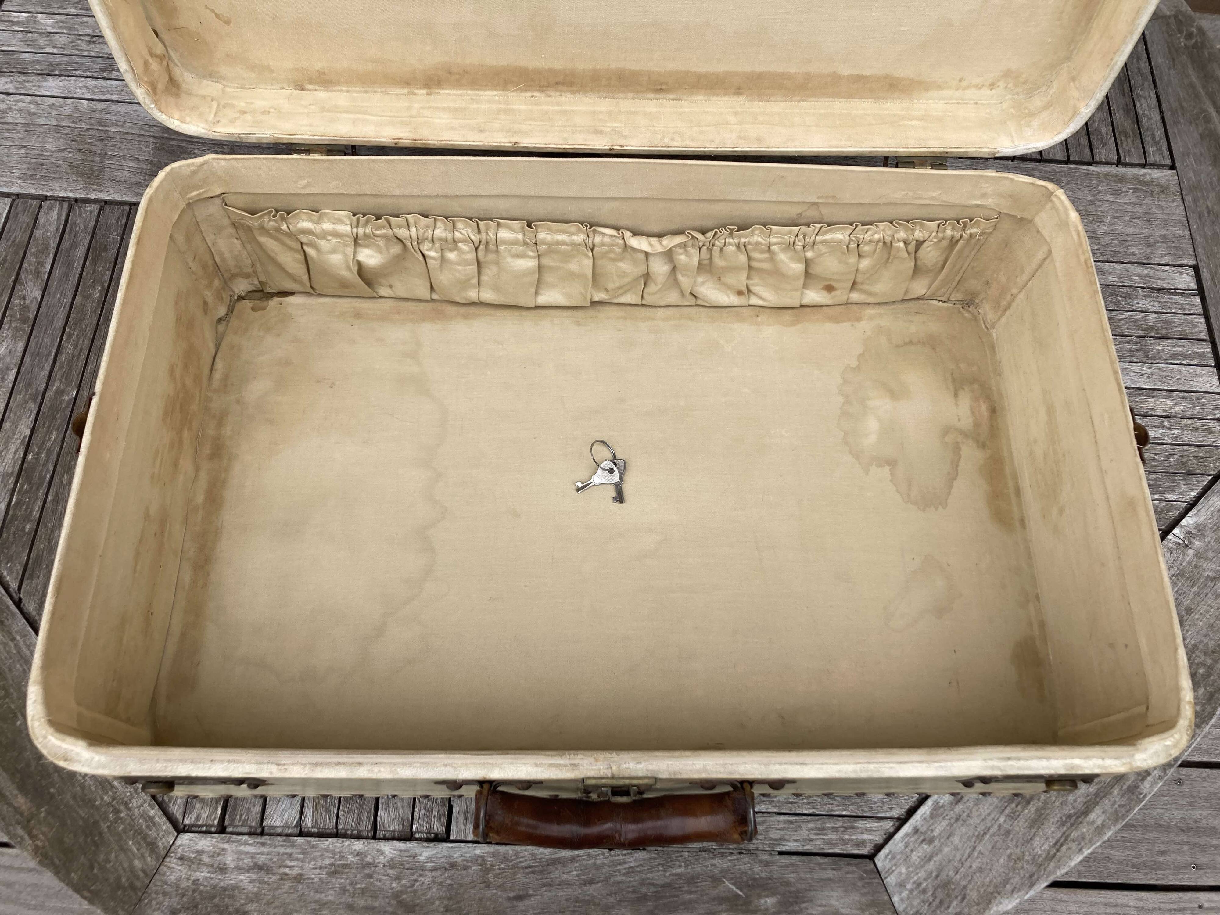 Vintale white leather suitcase