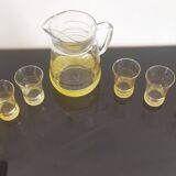 Old pitcher with its 8 yellow granite glasses with gold edging vintage 50's