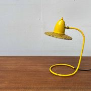 Perforated metal table lamp in Mid-Century Modern style, in the style of Mathieu Matégot, 1960s.