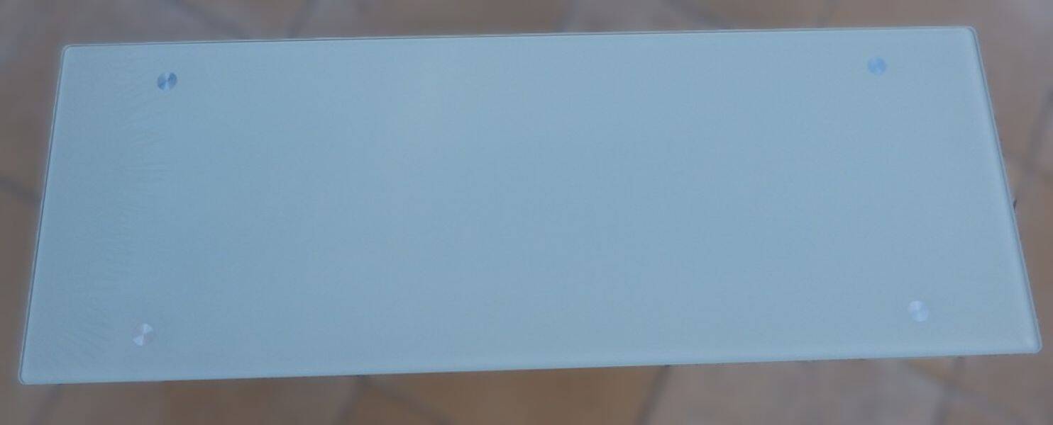 Long modern coffee table in glass and off-white metal - as new.