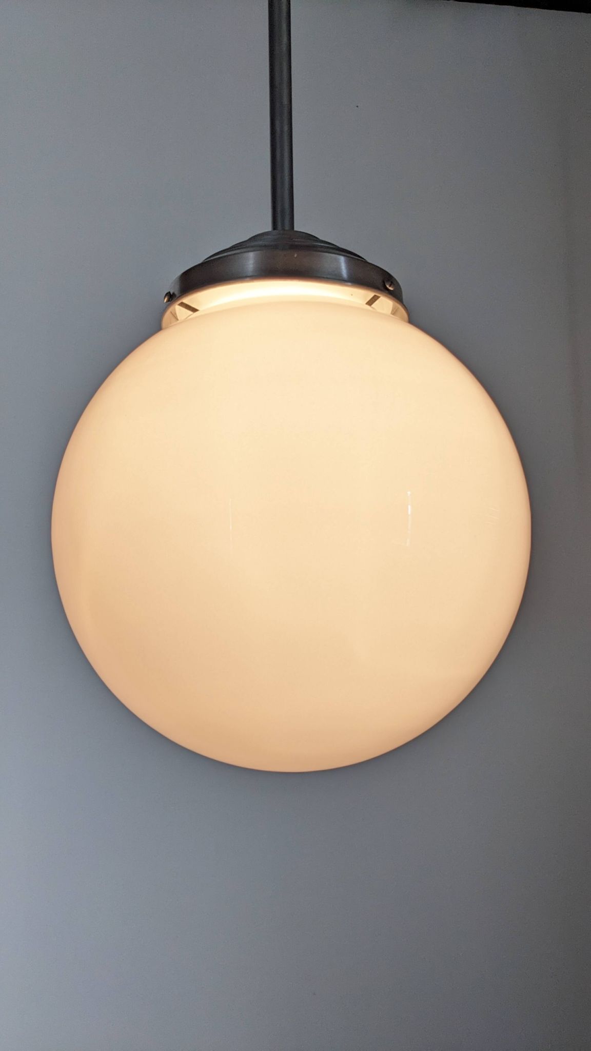 XL Art Deco white opaline ball pendant light, France circa 1920