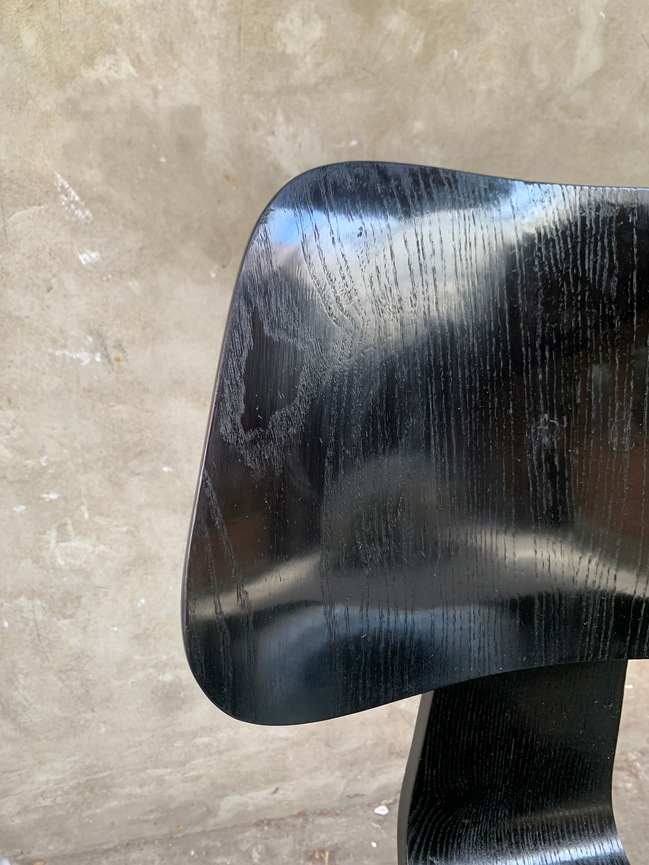 Pair of DCW chairs by Charles & Ray Eames in Black for Herman Miller 1950