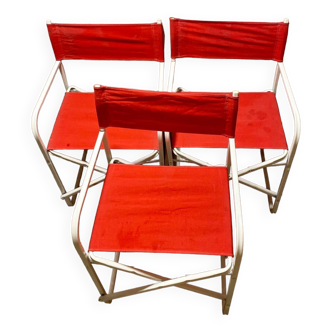 Red vintage canvas folding chairs
