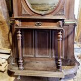 Coat rack with oval mirror