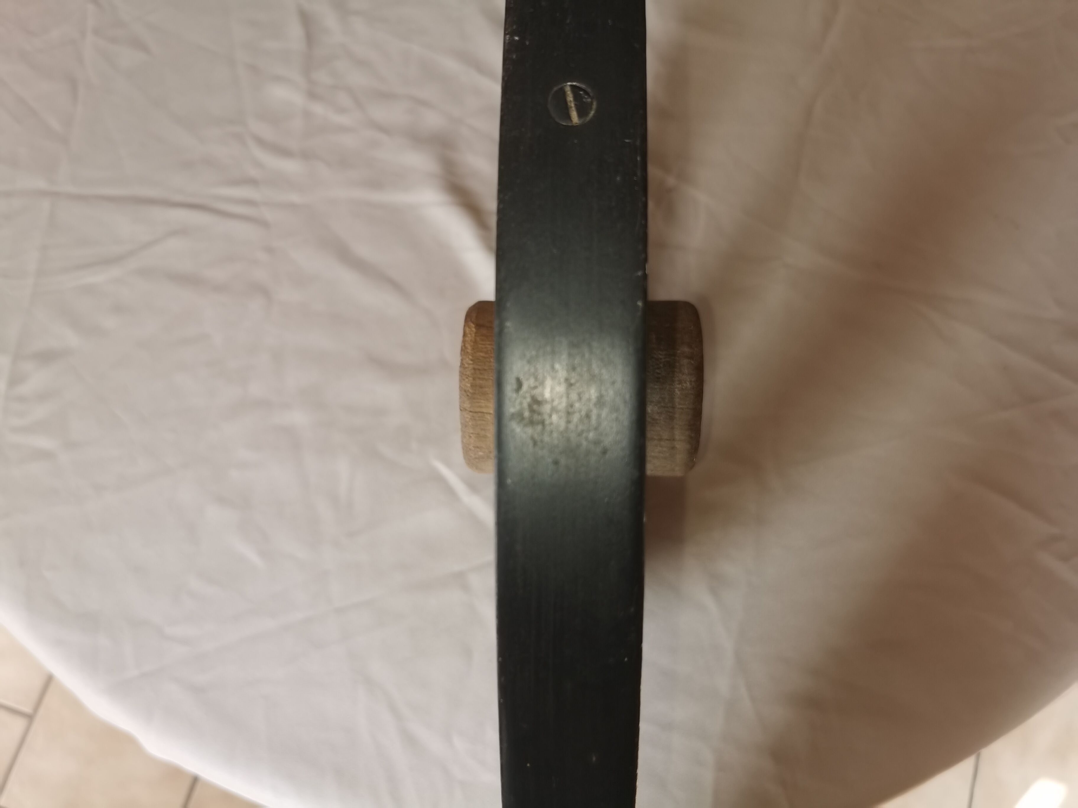 Old wheelbarrow or plow wheel