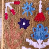 Tapis tufté à la main