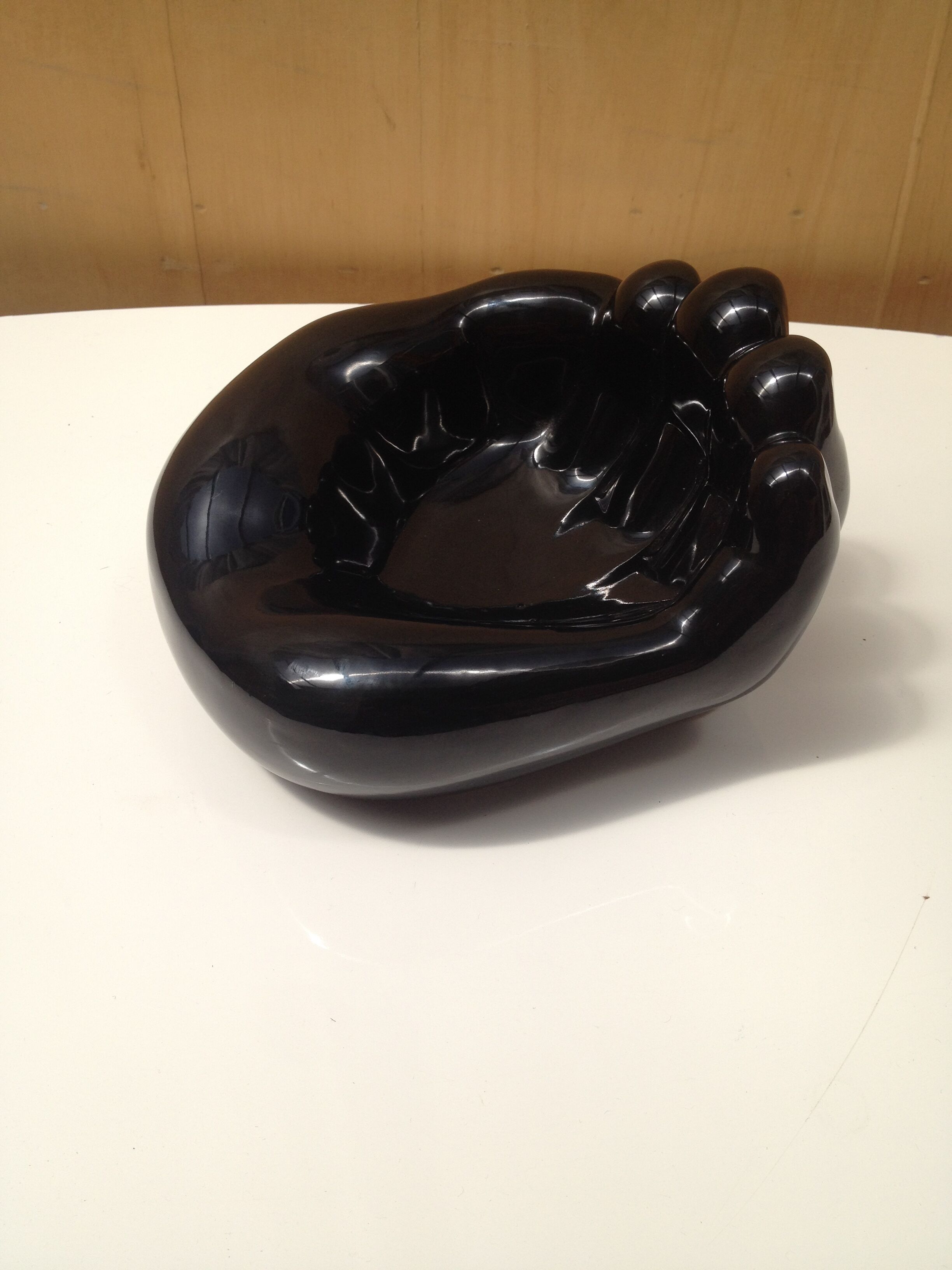 Empty ceramic hand shape pocket