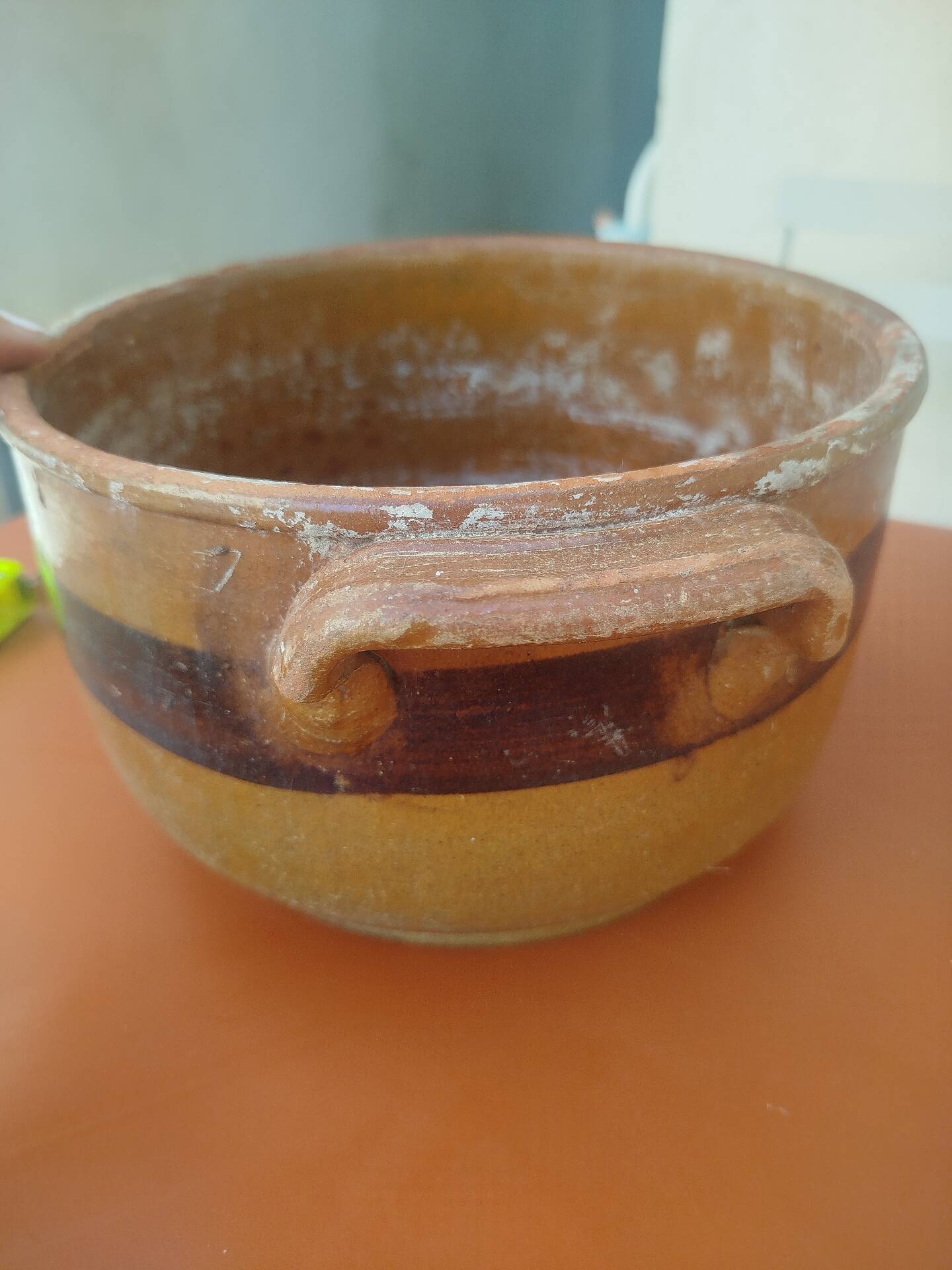 Old terracotta casserole