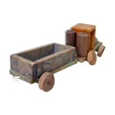Old wooden train locomotive and toy trailer