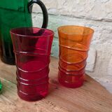 Mismatched colored glass orangeade set with pitcher and 6 glasses