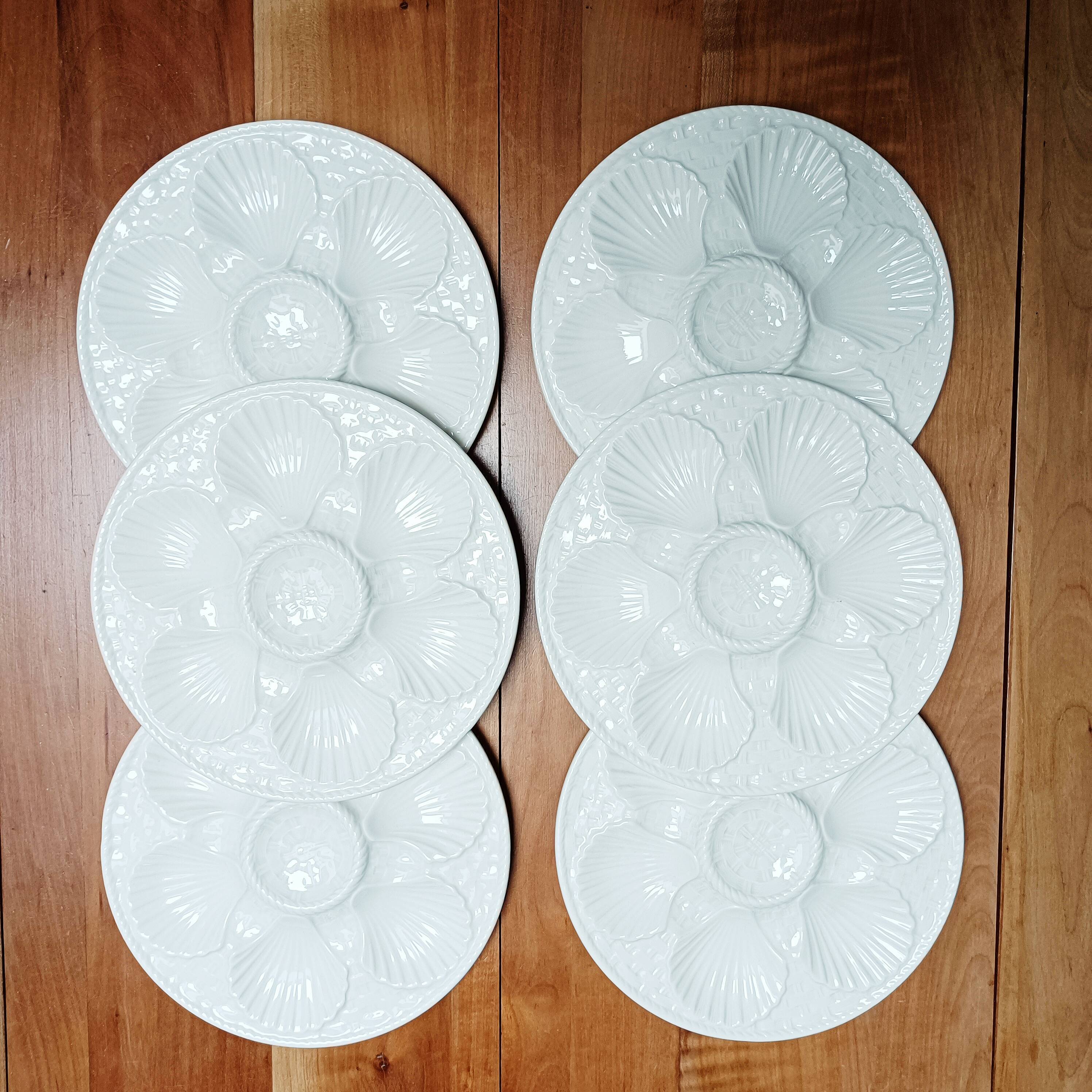 Set of 6 white oyster plates, Longchamp
