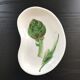 Artichoke decor pocket emptier