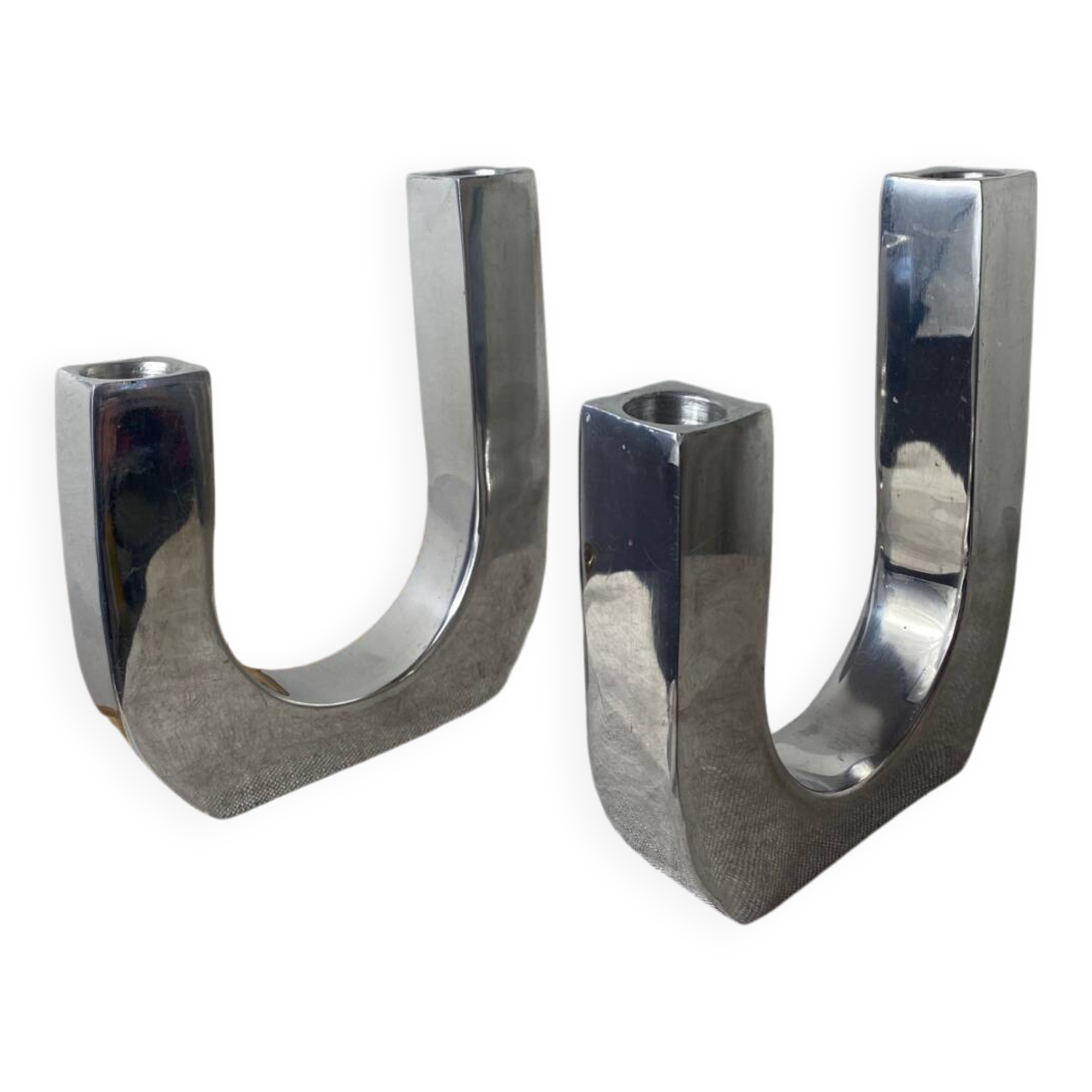 Designer candle holders in brushed aluminum
