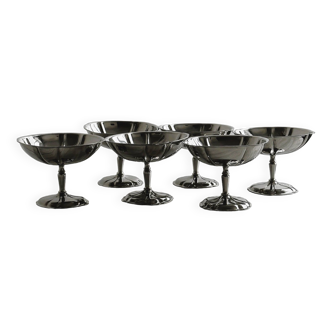 6 large stainless steel standing cups, France.
