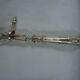 Leg of lamb handle, silver metal tongs and lined silver handle