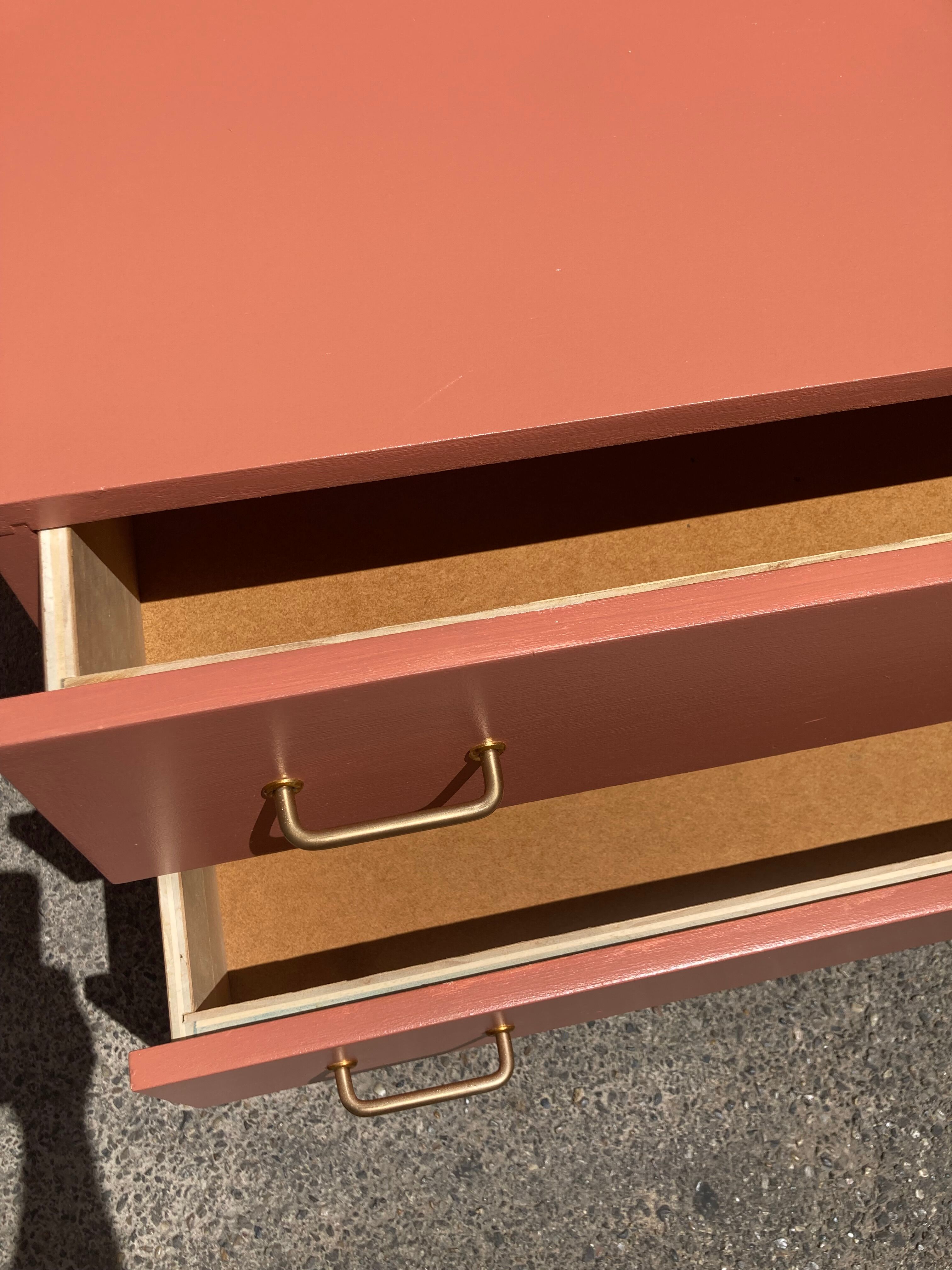 Vintage terracotta bass chest of drawers