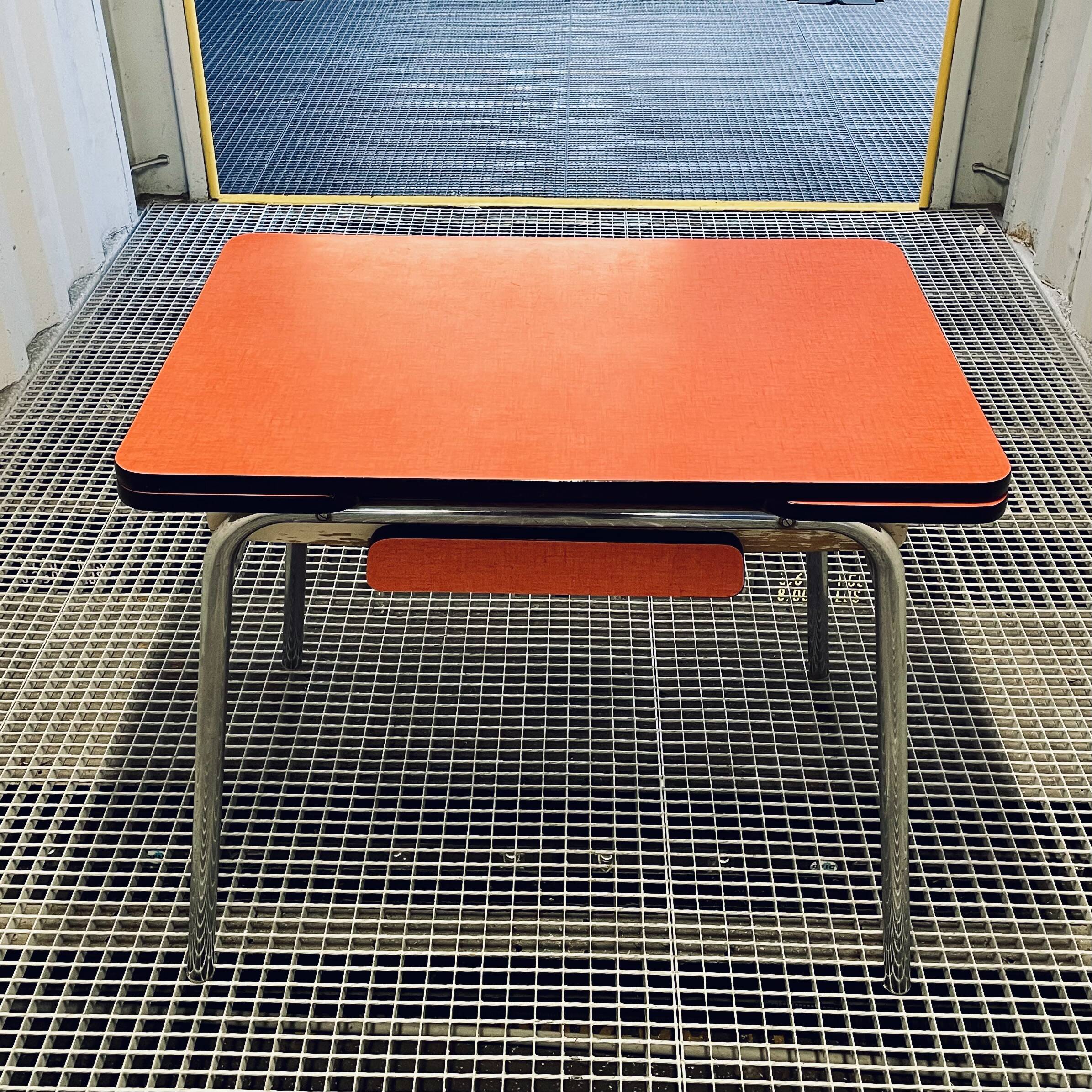 Red Formica table and vintage yellow chairs
