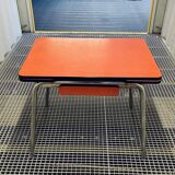 Red Formica table and vintage yellow chairs