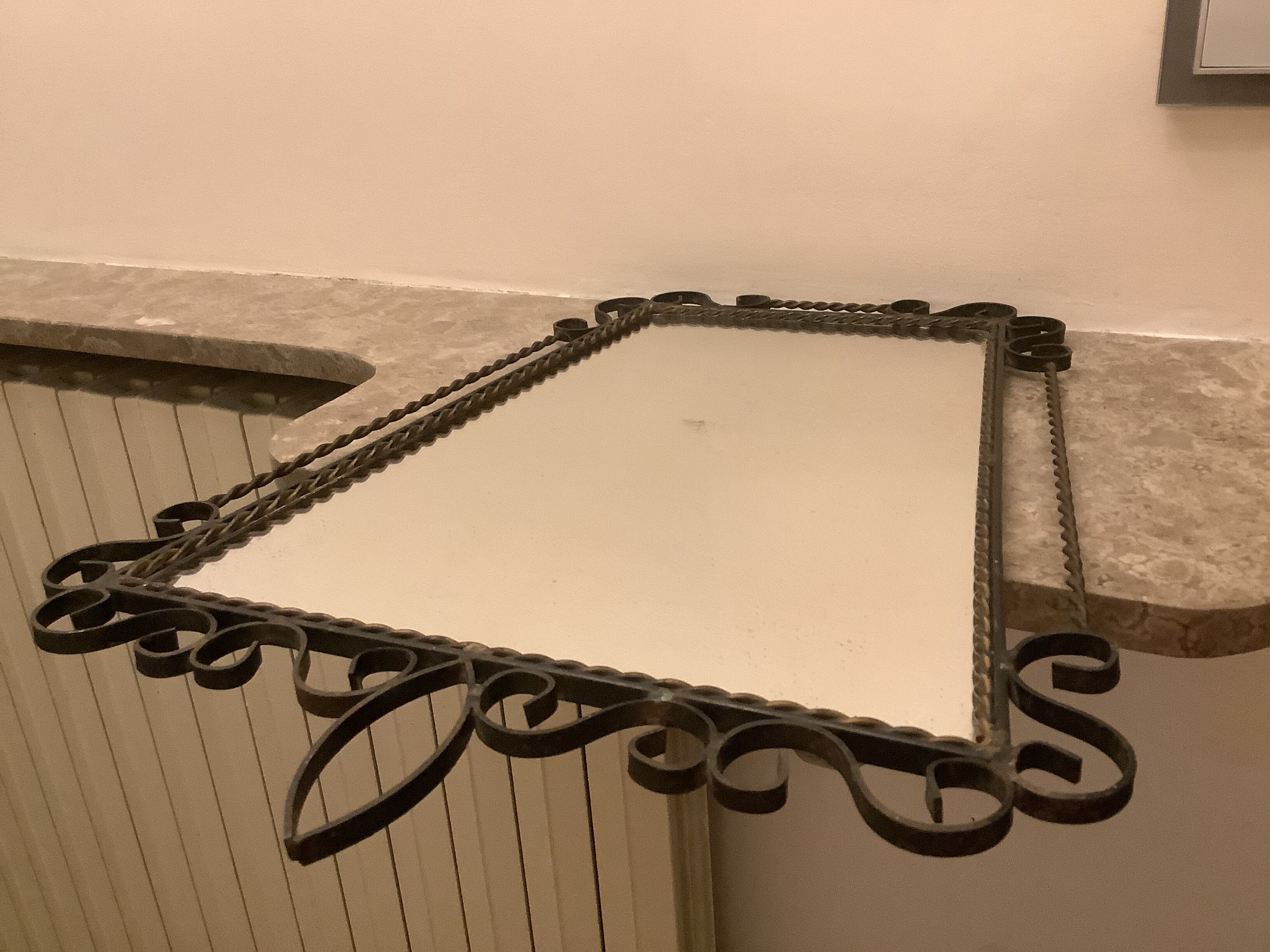 Ancient asymmetrical brutalist mirror wrought iron