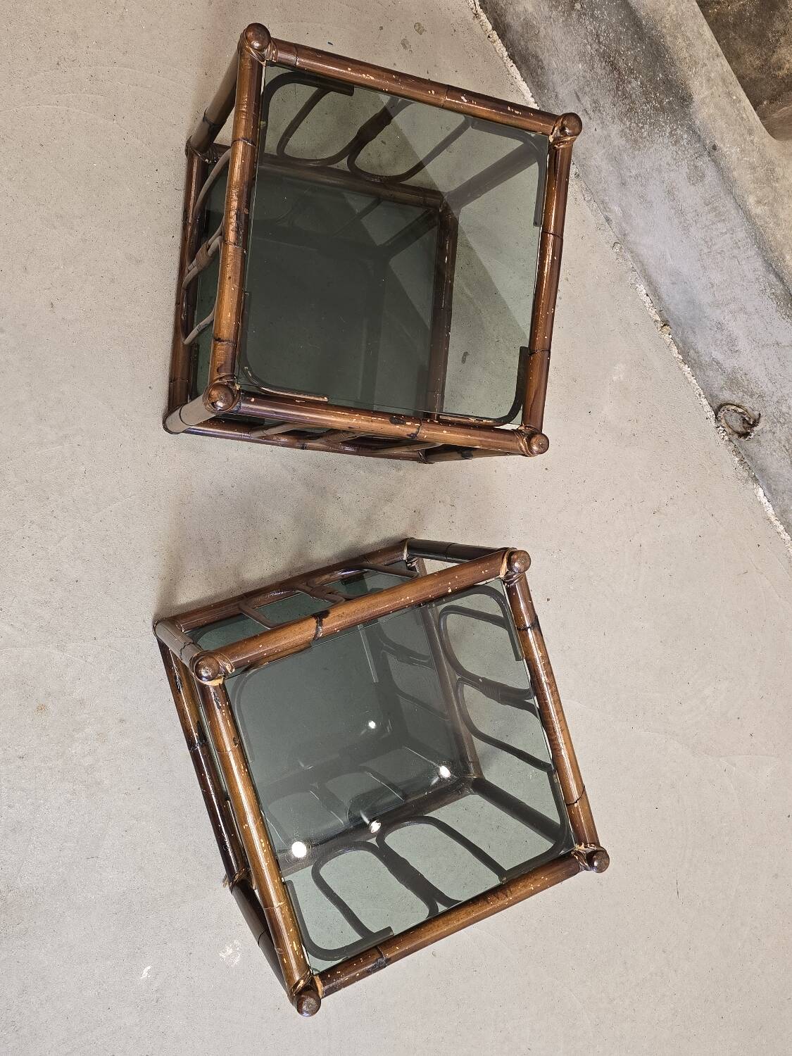 Two rattan and smoked glass tables, 1970