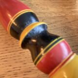 Polychrome turned wooden candlesticks