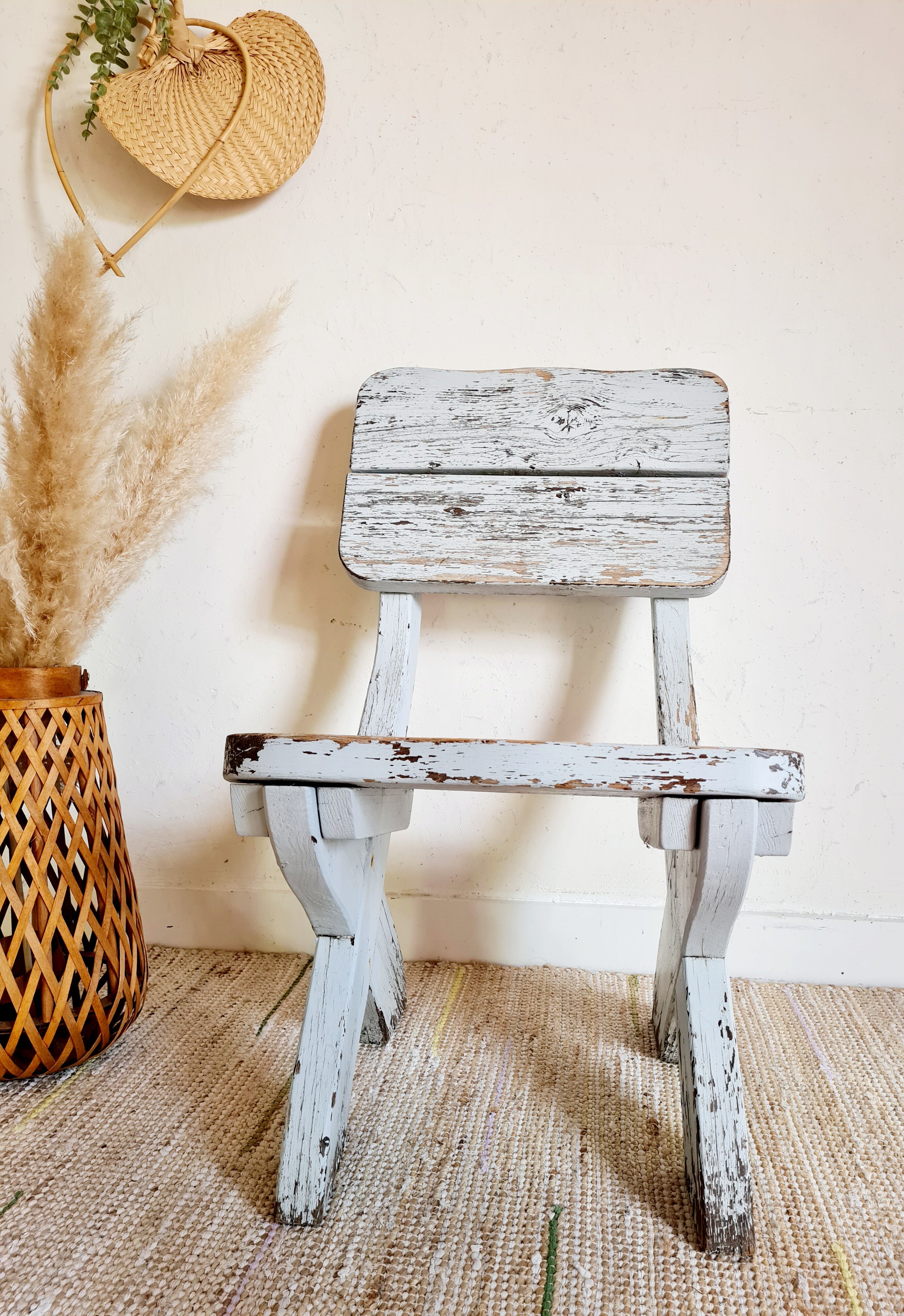 Patinated white old garden chair