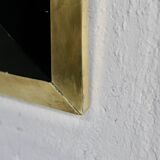 Jean-Claude Mahey mirror. Black lacquered wood and gold metal. 1970