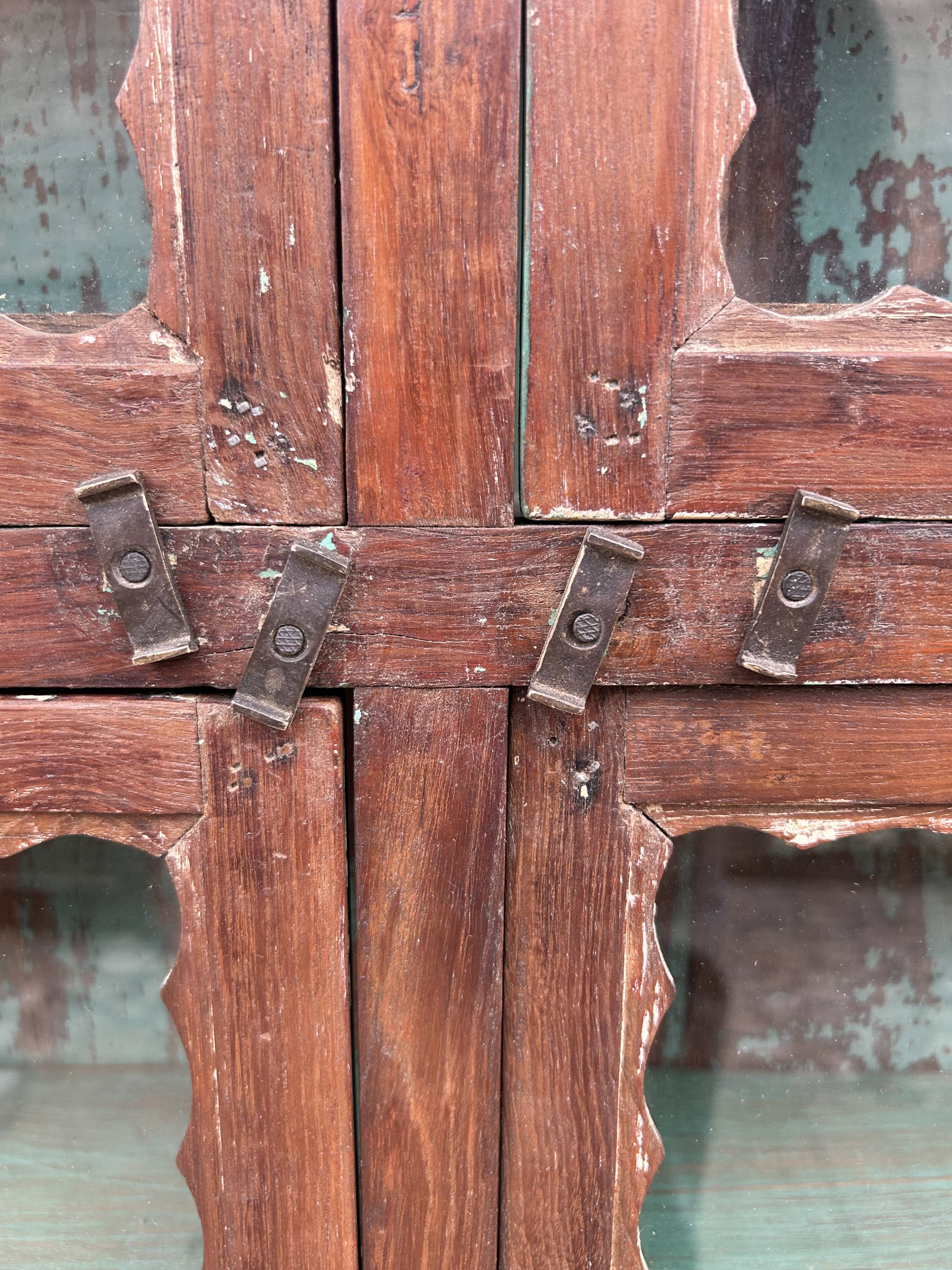 glass library in Burmese teak