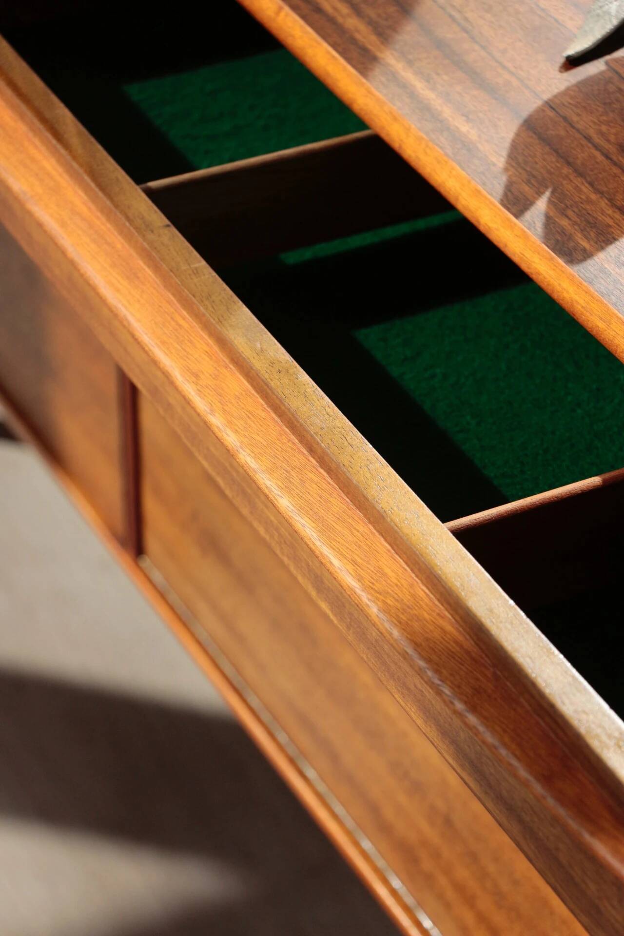 Vintage zebrano and walnut furniture from Morris of Glasgow.