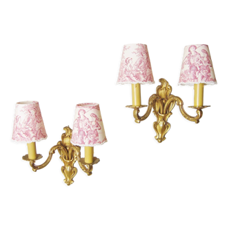 Pair of bronze sconces with four handmade toile de Jouy lampshades in France