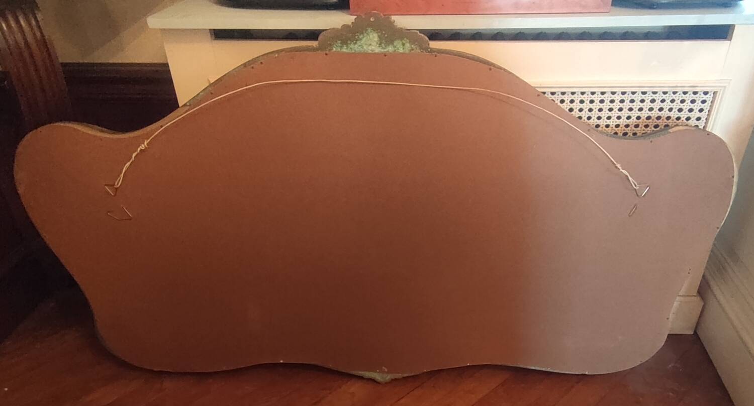 Old large golden mirror